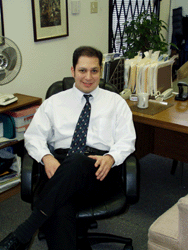 Doctor Armando Daniel Segovia, waiting to help ease your back pain